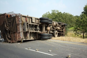 flipped-over-tractor-trailer-in-sunlight