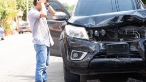 man-stressed-over-truck-accident