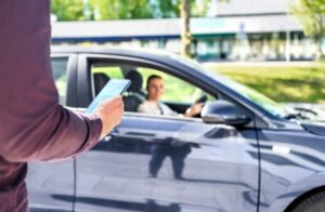 person using app to call a Lyft