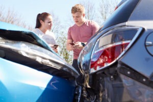 Uber driver exchanging info at crash site